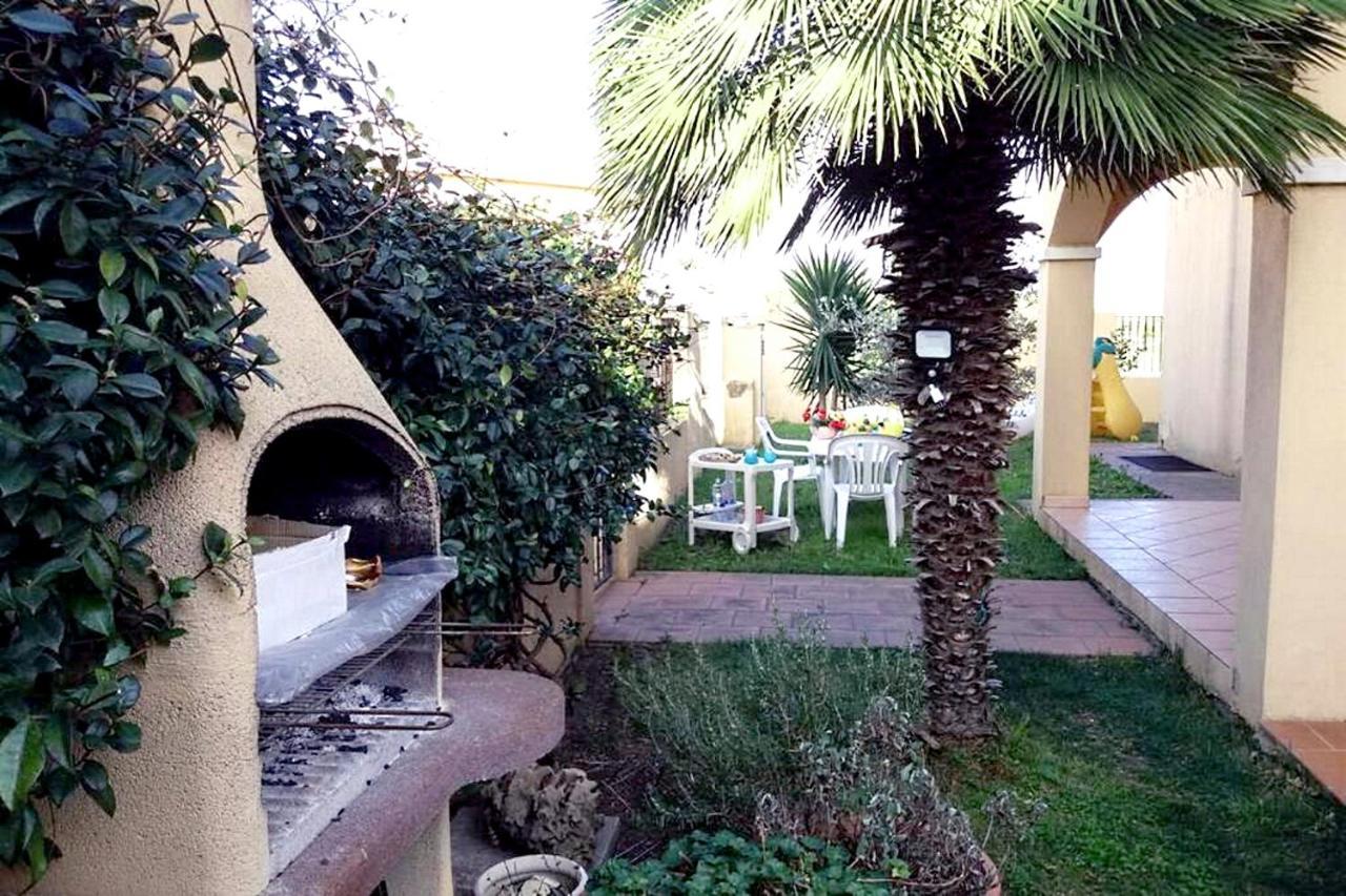 Appartamento La Rocca ตอร์โตลี ภายนอก รูปภาพ