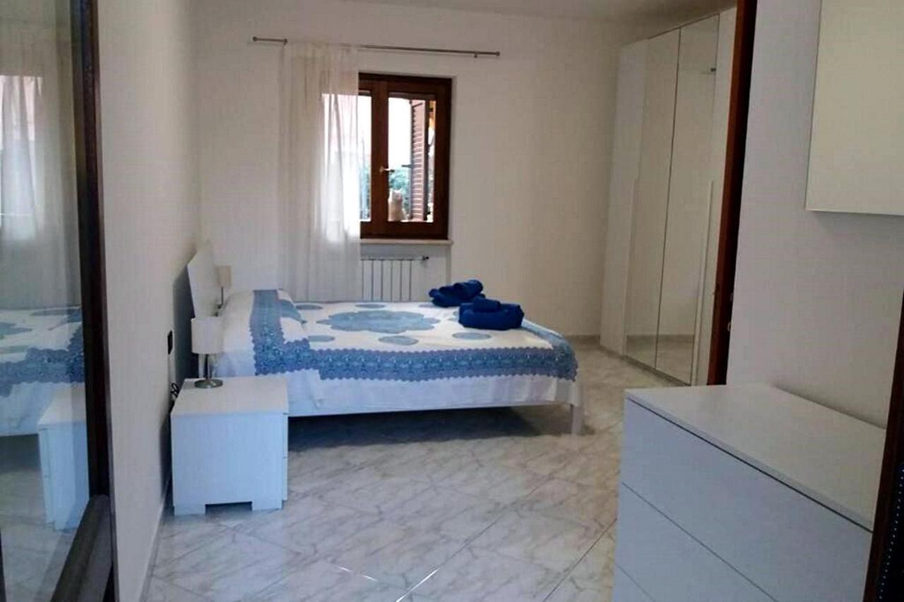 Appartamento La Rocca ตอร์โตลี ภายนอก รูปภาพ