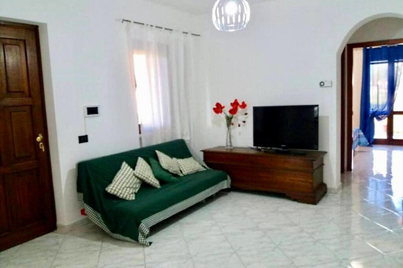 Appartamento La Rocca ตอร์โตลี ภายนอก รูปภาพ