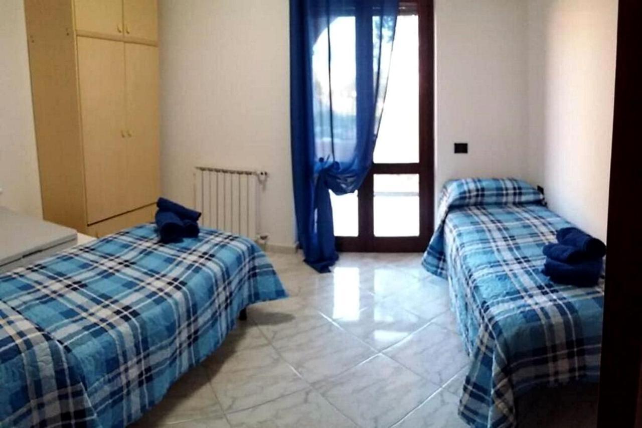 Appartamento La Rocca ตอร์โตลี ภายนอก รูปภาพ